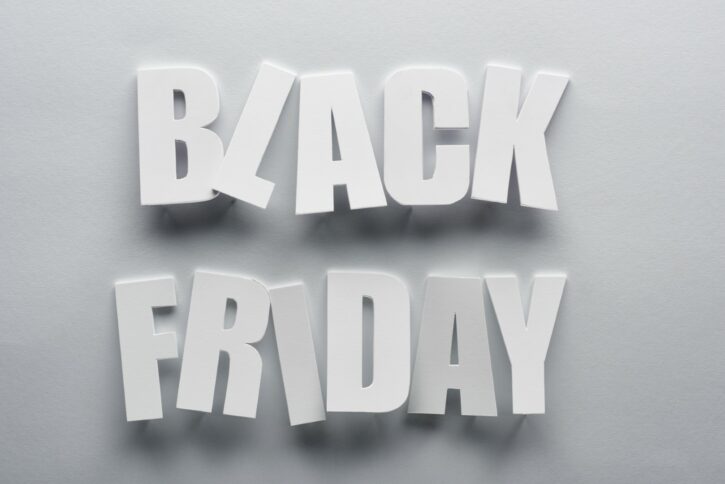Top View of Black Friday Lettering on Grey Background