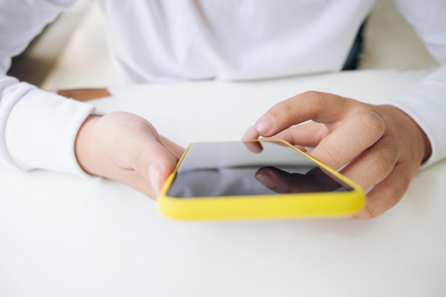close-up-of-a-man-using-mobile-smart-phone
